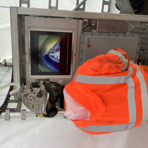 Ole Andreas Topnes from Remotion is controlling the robot safely from outside of the tank